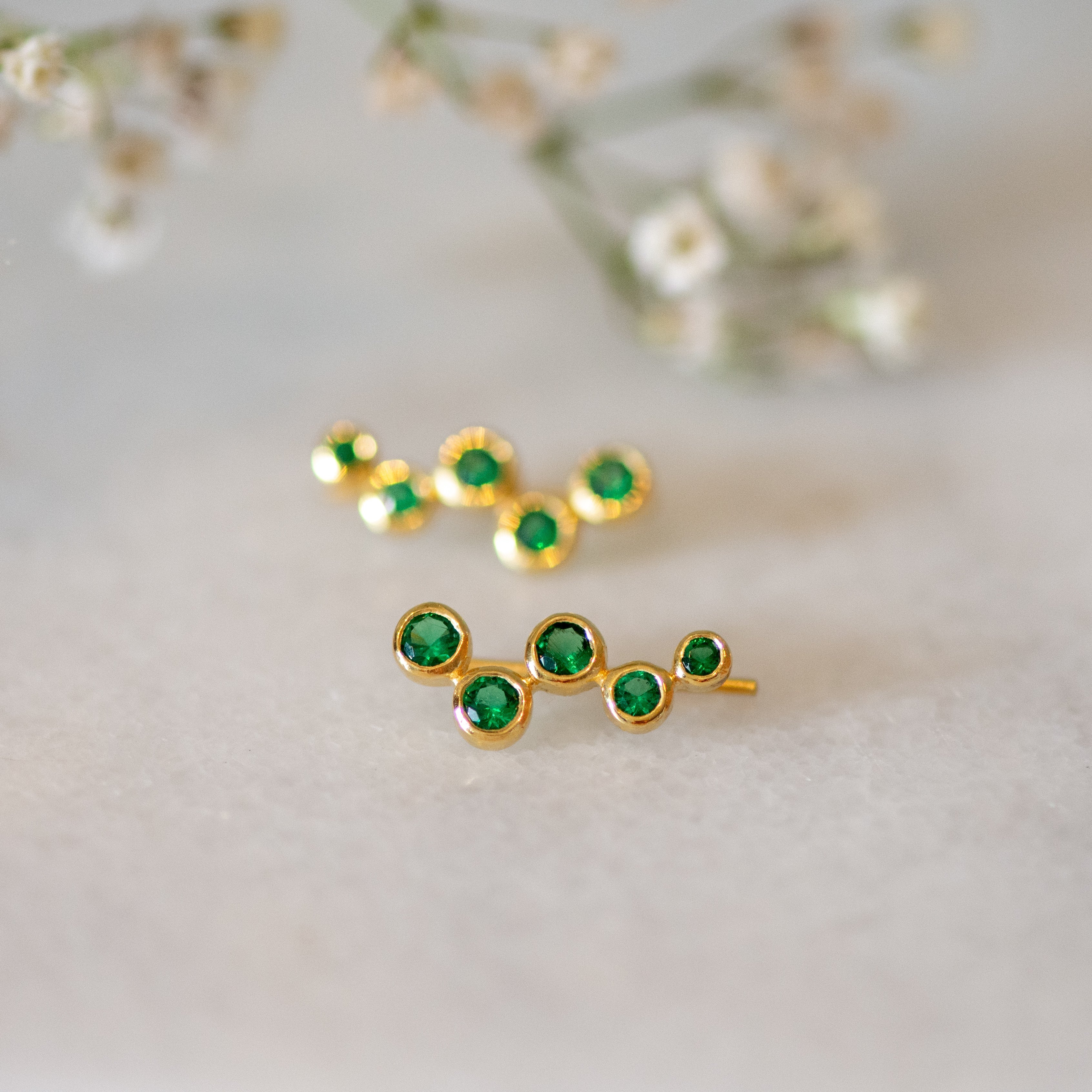 Aquila Studded Ear Jewel in Gold with Emerald Zirconia Earring Memara