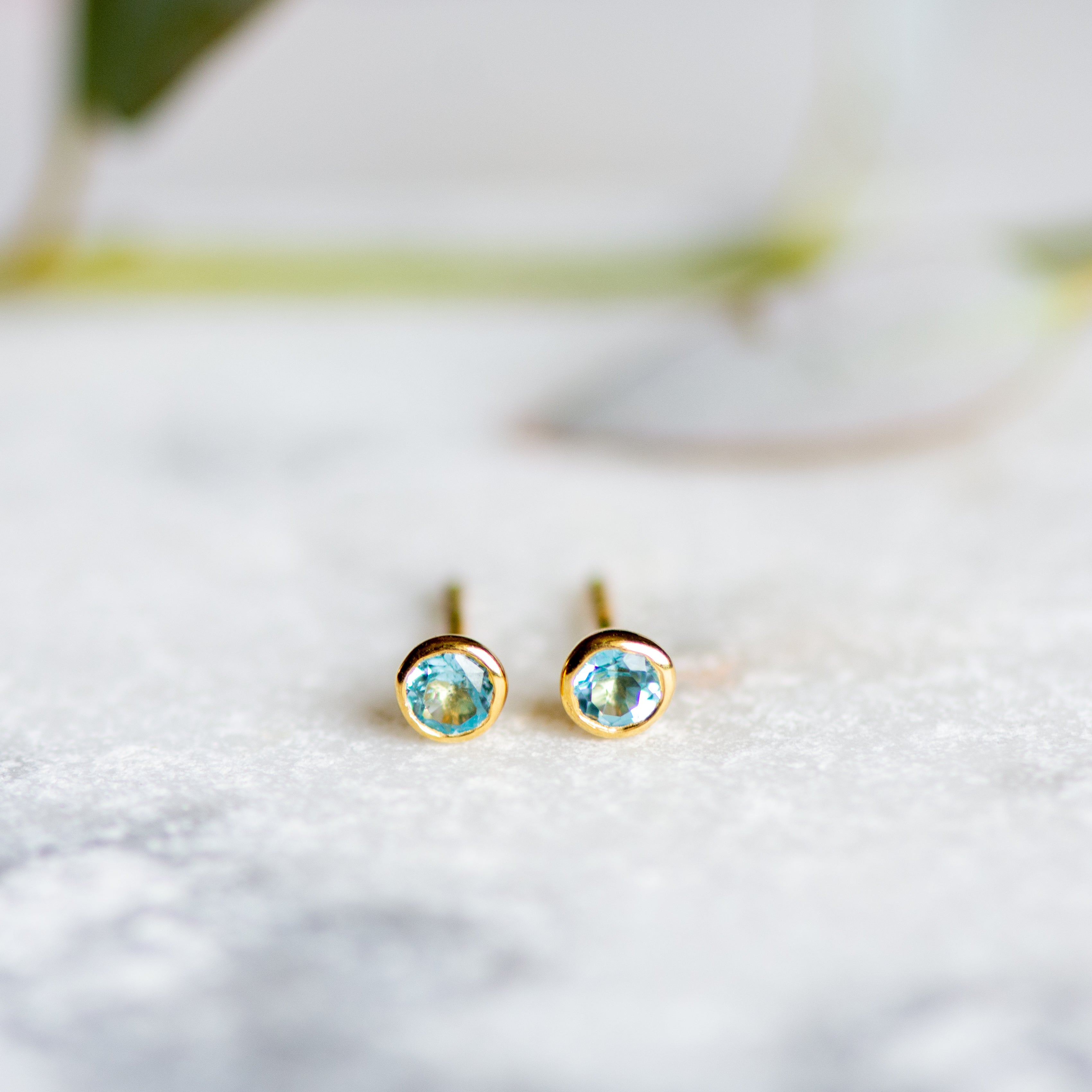 Acer Ear stud in Gold with Blue Topaz Earring Memara