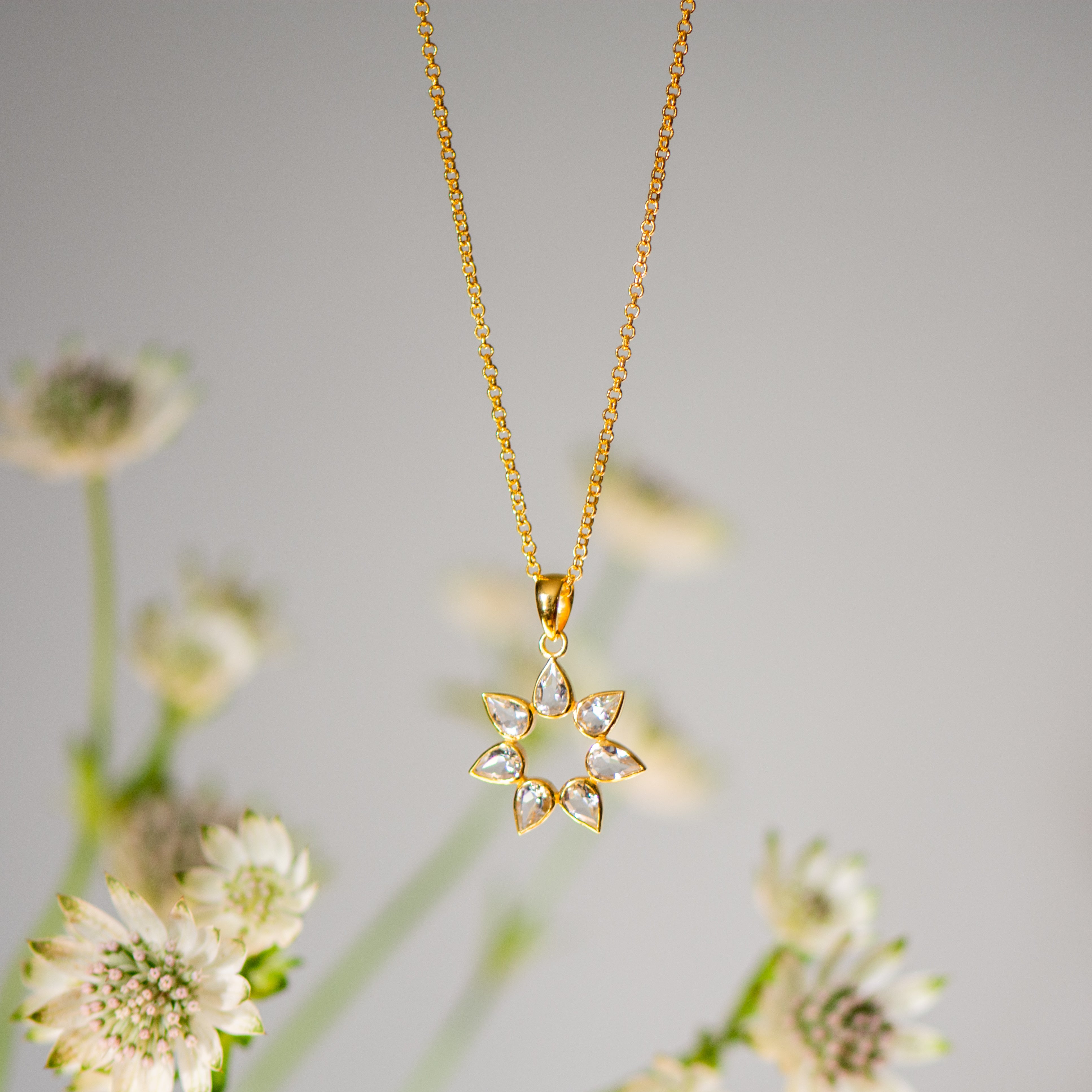 flower gold pendant with green amethyst from memara