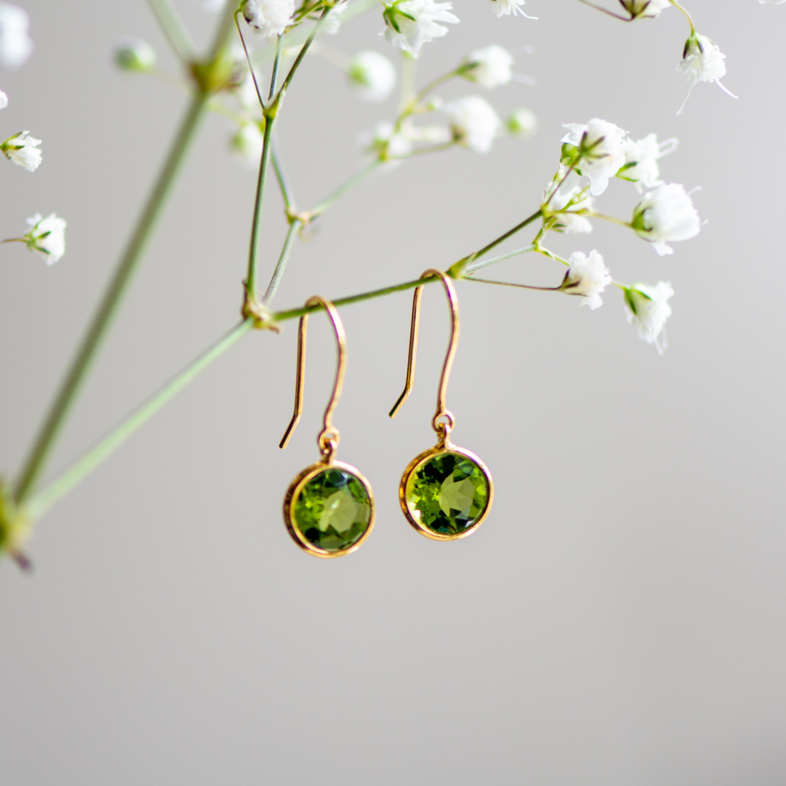peridot gold dew drop earrings from memara