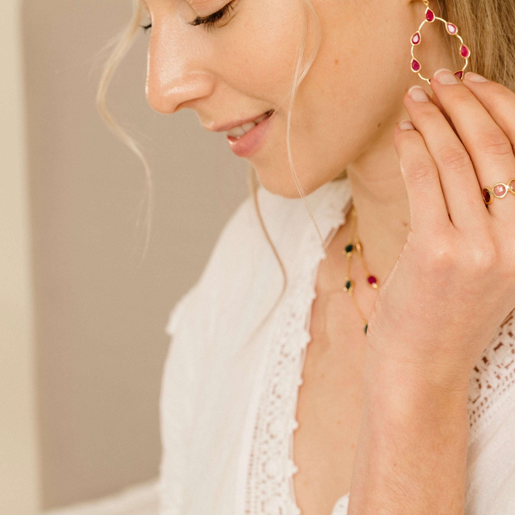 Tikka in Gold with pear shaped ruby droplets. Earring Memara