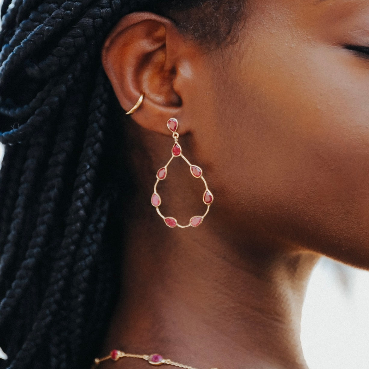 Tikka in Gold with pear shaped ruby droplets. Earring Memara