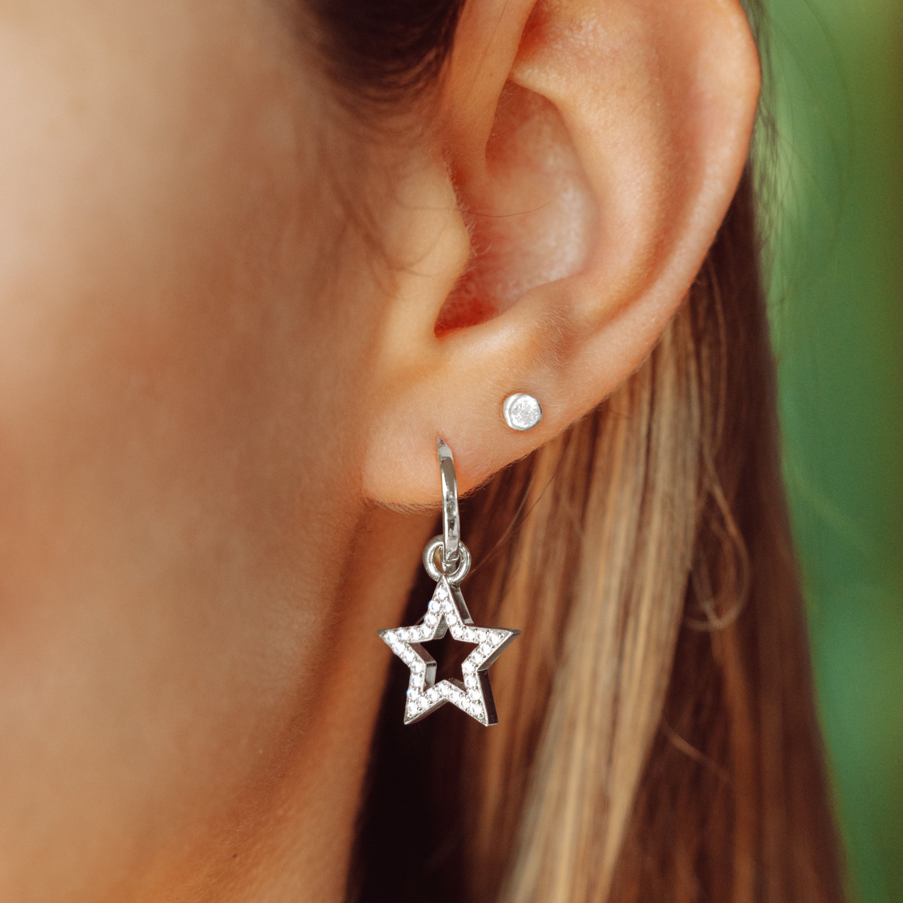 Star charm earrings