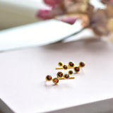 aquila garnet gold ear studs from memara